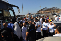  بالصور: عودة فوج معتمري العشر الأوائل من شهر رمضان المبارك إلى مدينة يافا سالمين